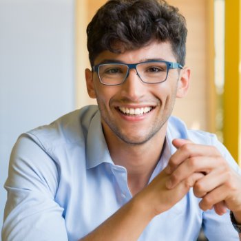 Young man wearing glasses Dental Care   Acworth patient care