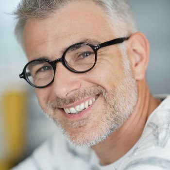 Handsome mature man with glasses Dental Care   Acworth care