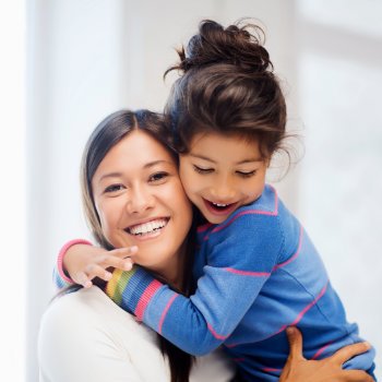 Happy mother hugging daughter Dental Care   Acworth care