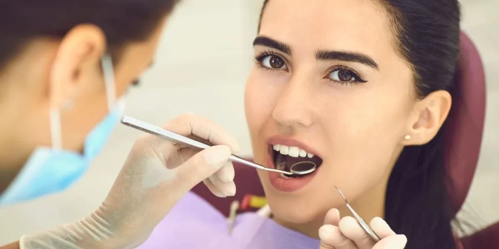 Patient consultation for restorative dental implants in clinic