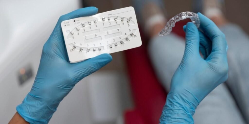 Athletic mouthguard   Acworth shown during dental fitting exam