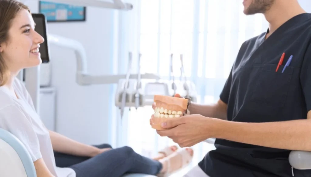 Dentist explaining restorative dentistry options to patient